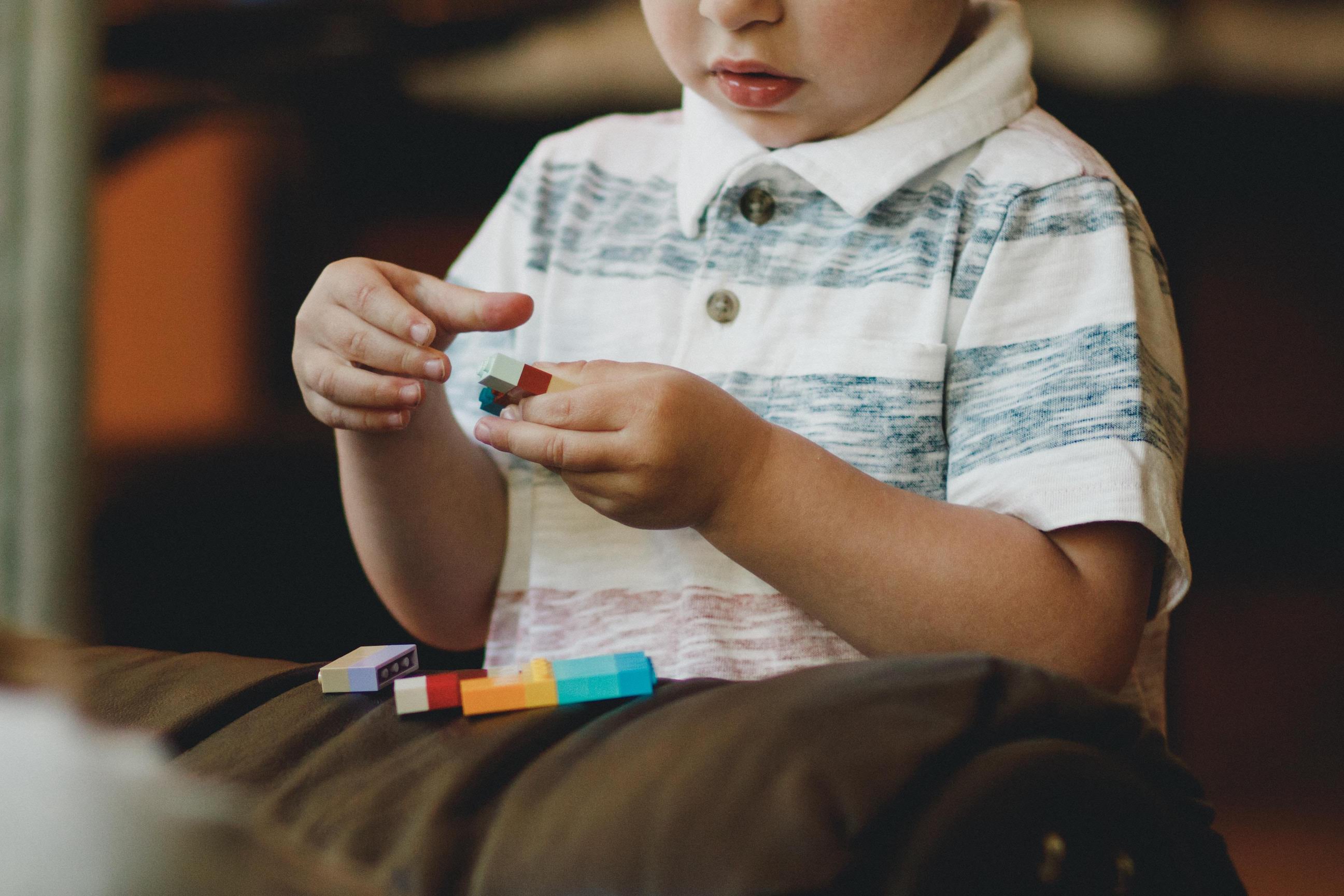 Child playing lego