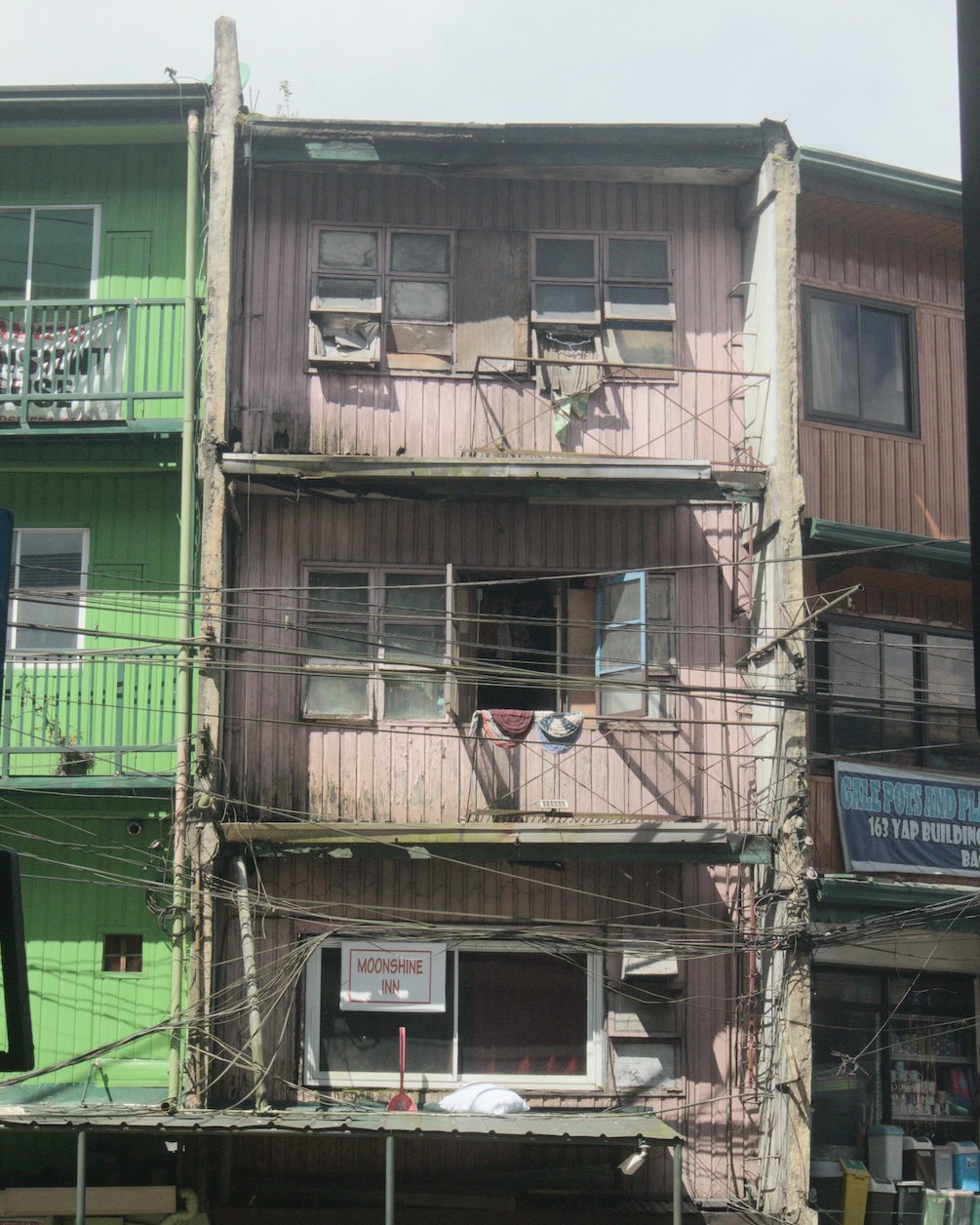 A dilapidated multi-color building